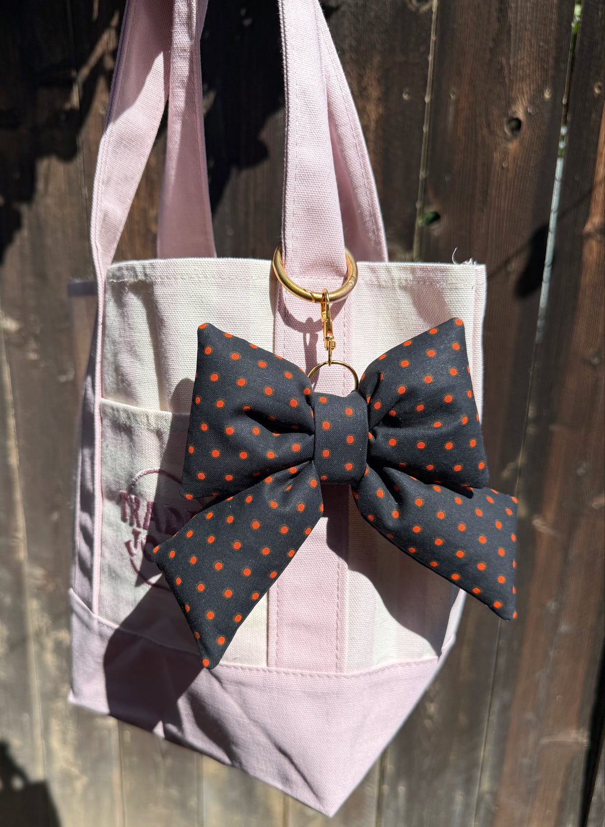 Black w/ orange dots Bow Charm